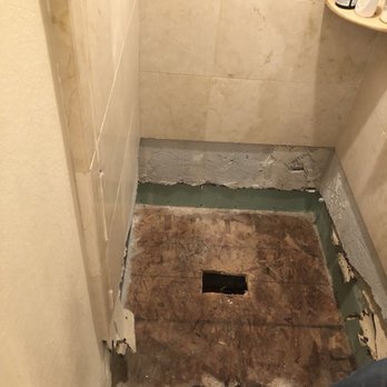Best Area Home Improvement - Shower base and tiles in the bathroom were removed due to water leak. - General Contractors Near Me - San Jose, California