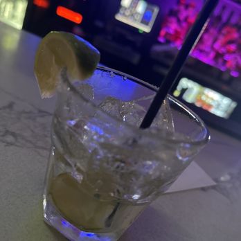 Sunset Lounge - a glass of lemonade with a black straw - Karaoke Near Me - Fullerton, California Sunset Lounge - a glass of lemonade with a black straw - Karaoke Near Me - Fullerton, California