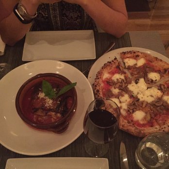 PizzArte - Left (eggplant Parmesan) and right (pizza with mushrooms, mozzarella, sausage, and basil) - Pizza Near Me - New York, New York PizzArte - Left (eggplant Parmesan) and right (pizza with mushrooms, mozzarella, sausage, and basil) - Pizza Near Me - New York, New York