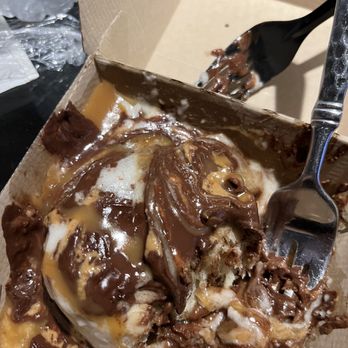 Cinnaholic - Cinnamon roll with cream cheese, peanut butter cups, and caramel...... - Bakeries Near Me - Grand Prairie, Texas
