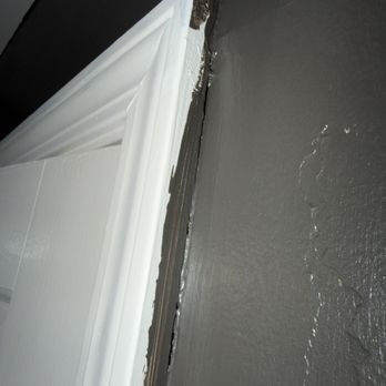 J Home Construction Services - Paint on right side of door trim with unsanded wall. - General Contractors Near Me - Arlington Heights, Illinois