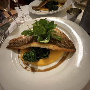 Le Parisien - Branzino over butternut squash and broccoli rabe. - French Near Me - New York, New York Le Parisien - Branzino over butternut squash and broccoli rabe. - French Near Me - New York, New York