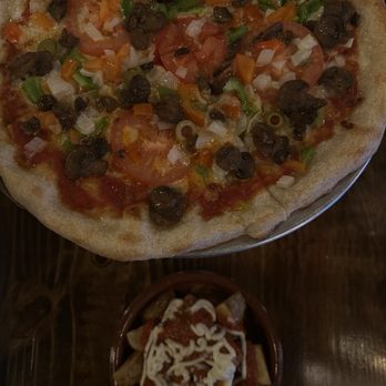 Next Corner Tapas & Bar - vegetable pizza & patatas bravas - Mediterranean Near Me - Clewiston, Florida Next Corner Tapas & Bar - vegetable pizza & patatas bravas - Mediterranean Near Me - Clewiston, Florida