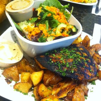 Dr Grubb's - Blackened salmon with garlic apple aioli sauce, a side salad, and potatoes. - American Near Me - Claremont, California