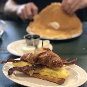 Garretts Mill Diner - Breakfast sandwich with bacon and pepper jack cheese. And a short stack of pancakes in the back! - Breakfast & Brunch Near Me - Stow, Ohio Garretts Mill Diner - Breakfast sandwich with bacon and pepper jack cheese. And a short stack of pancakes in the back! - Breakfast & Brunch Near Me - Stow, Ohio