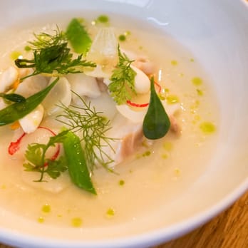 David Toutain - Cured Cod with Fresh Shaved Almonds, Clams, Radish with a Consomme of Lemongrass, Kaffir Leaves, Fennel and Onion - Modern European Near Me - Paris, 75 David Toutain - Cured Cod with Fresh Shaved Almonds, Clams, Radish with a Consomme of Lemongrass, Kaffir Leaves, Fennel and Onion - Modern European Near Me - Paris, 75