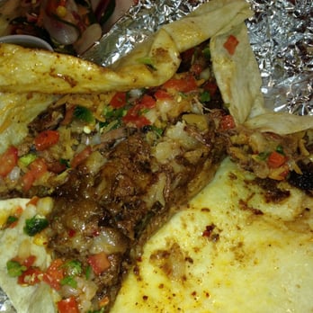 Los Compadres - Inside hubby's barbacoa burrito :-) - Meat Shops Near Me - Franklin, Tennessee