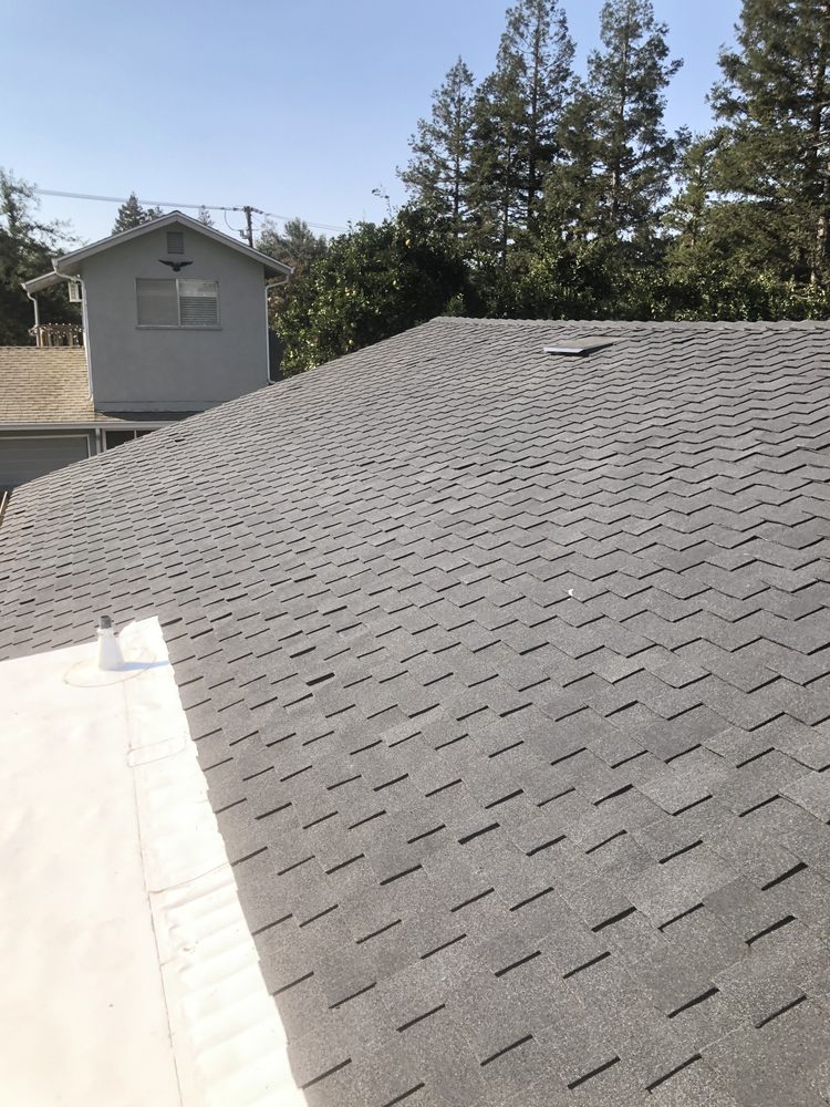 Slide of Econo Roofing