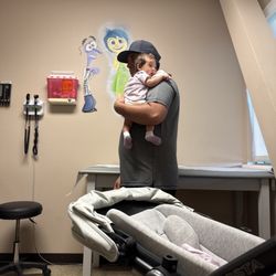 Bright Futures Pediatrics - Baby and dad