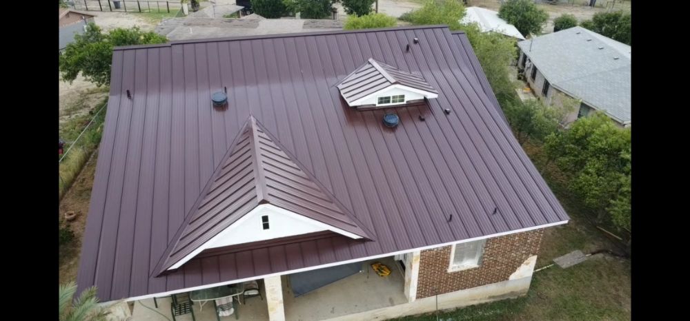 Slide of Metal Master Roofing