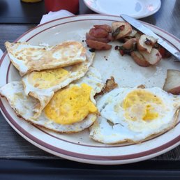 My two "over medium" eggs and then the two replacement "over medium" eggs. My two "over medium" eggs and then the two replacement "over medium" eggs.