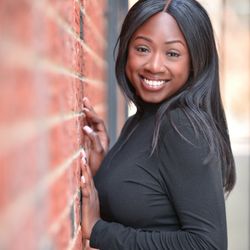 Headshots By Scott - A bright, relaxed outdoor portrait with warm background blur. Headshots by Scott, Woodside, Queens.