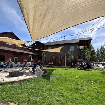 High Camp Taphouse - Outdoor seating with shaded areas. - Himalayan/Nepalese Near Me - Sisters, Oregon