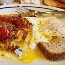 IHOP - Eggs over east, sausage, hashbrowns and whole wheat toast, also coffee