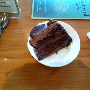The Natural Cafe - Dense, delicious, dark chocolate layer cake with a dark chocolate leaf. Heavenly. - Burgers Near Me - Moorpark, California The Natural Cafe - Dense, delicious, dark chocolate layer cake with a dark chocolate leaf. Heavenly. - Burgers Near Me - Moorpark, California