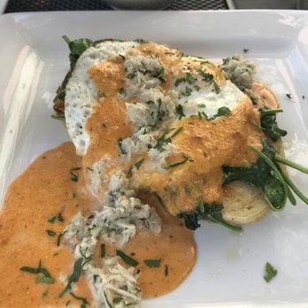 Moonshine 152 - Crabs egg Benedict. - New American Near Me - Boston, Massachusetts