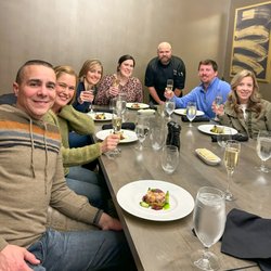 Chatt Taste Food Tour - Amazing group posing with Executive Chef Jeff Miller on Downtown Chattanooga Food Tour.