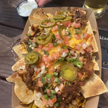 Wrong Iron - Pulled pork nachos - Beer Gardens Near Me - New Orleans, Louisiana Wrong Iron - Pulled pork nachos - Beer Gardens Near Me - New Orleans, Louisiana