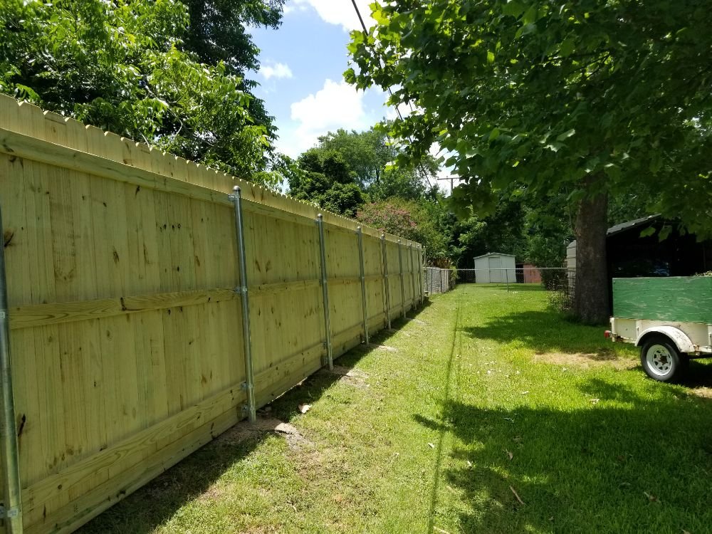 Slide of Pride of Texas Roof and Fence