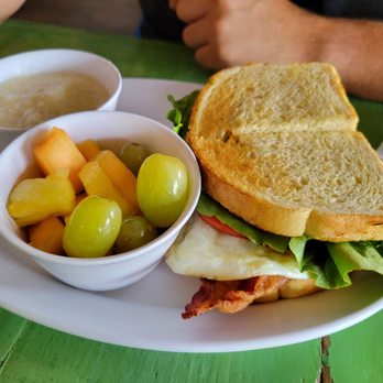 Banana River Cafe - BRC on sour dough with a side of grits and fresh fruit. - Cafes Near Me - Satellite Beach, Florida