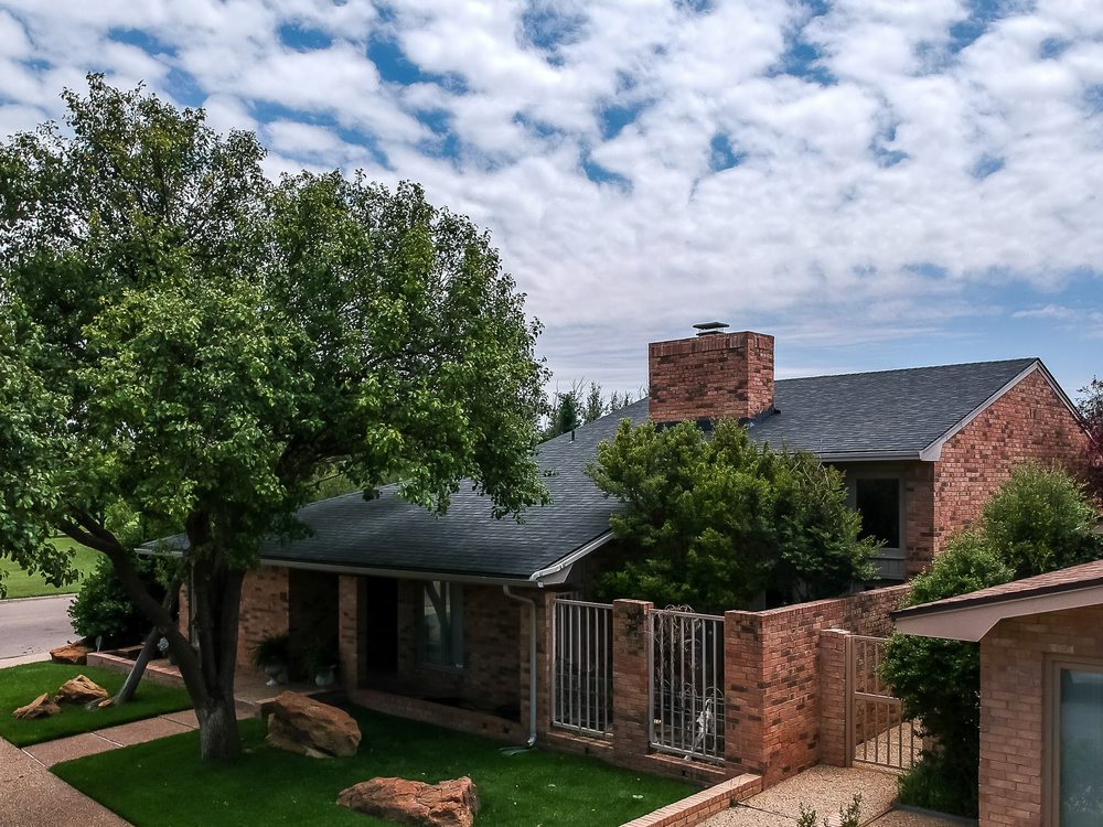 Slide of Andrus Brothers Roofing