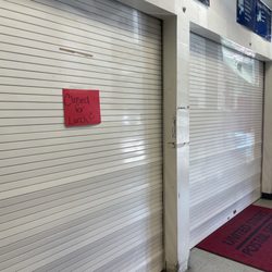 US Post Office - Closed for lunch. That's all the sign says.