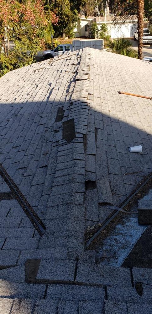 Slide of Expert Roofing Contractors