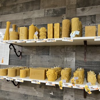 Queen Bee Gardens - a display of bees on shelves - Honey Near Me - Granby, Colorado