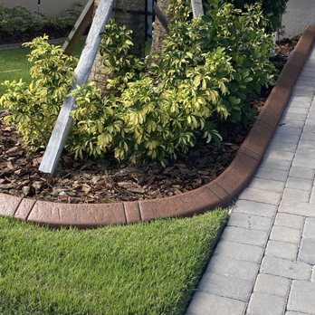 Florida Landscape Borders - brick edging around a tree - Lawn Services Near Me - Apopka, Florida Florida Landscape Borders - brick edging around a tree - Lawn Services Near Me - Apopka, Florida