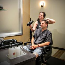 18|8 Fine Men's Salons - Elm Grove - Aimee blowdrying in one of our new favorite products from Reuzel. Visit 18|8 to check out their new tonics.