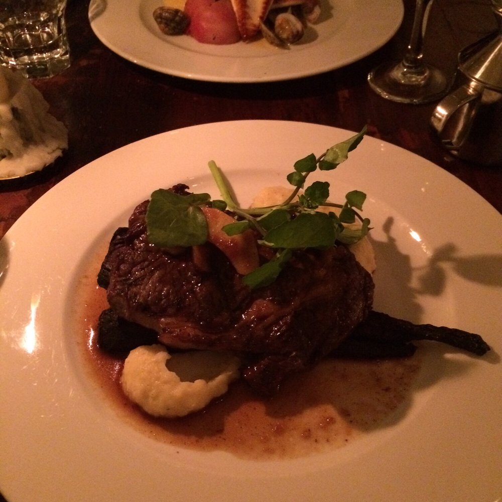 Mata Hari - Ribeye entree in front with catch of the day entree in the back. - Bars Near Me - Amsterdam, New Hampshire Mata Hari - Ribeye entree in front with catch of the day entree in the back. - Bars Near Me - Amsterdam, New Hampshire