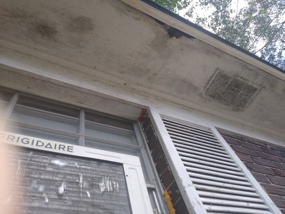 Slide of Tadlock Roofing