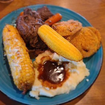 Ramsey's Diner - Andover - Pot roast with mashed potatoes, fried green tomatoes, and deep fried corn on the cob. - Diners Near Me - Lexington, Kentucky