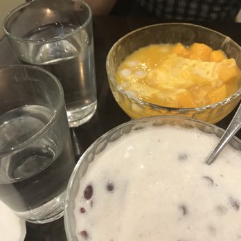 Mango Mango Dessert - LOL I mixed the red bean one with glutinous balls so it looks like congee but it's bout the taste not the look! It wasn't bad - Desserts Near Me - Flushing, New York