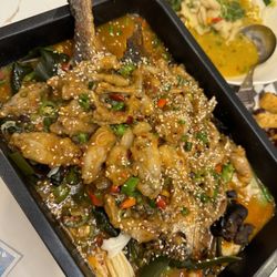 Chengdu cuisine - Whole Fish in Spicy Chili Sauce topped with Frog Legs