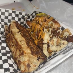 Green chili burrito with Cutty Fries in The Cut Green chili burrito with Cutty Fries in The Cut