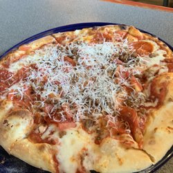 Il Vicino Wood Oven Pizza - College Hill - Pizza with Pepperoni, sausage and slices of tomato on it.