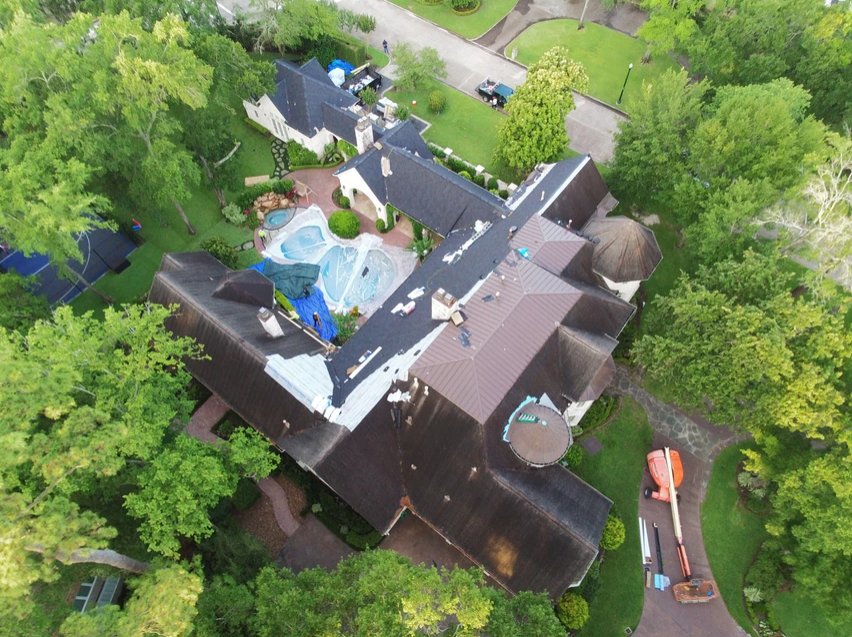 Slide of Bone Dry Roofing and Restoration