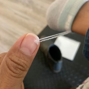 Bora Bora Nail Salon - Photo 4: Other thumb also cracked but not all the way. I'm having to use band-aids most of the time to prevent this! - Nail Salons Near Me - Houston, Texas