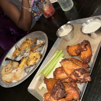 Voodoo Bayou - Wings and oysters - Cocktail Bars Near Me - Orlando, Florida