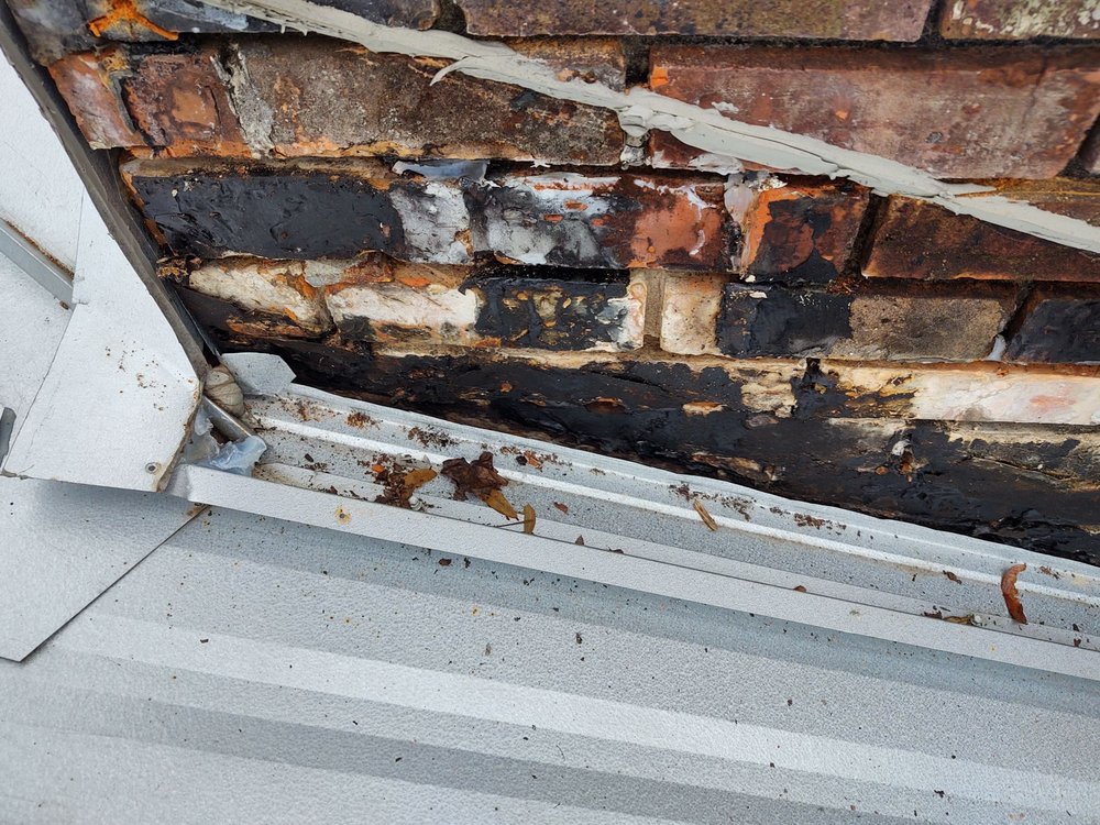 Slide of T-Roy's Relief Roofing