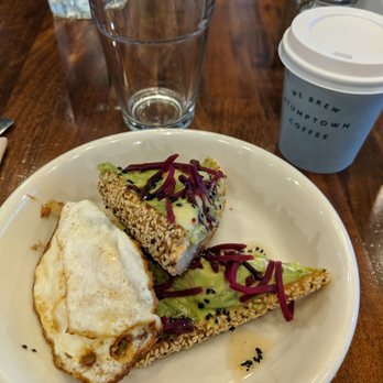 Floret - Avocado toast with an egg and a small cappuccino - Vegetarian Near Me - Seattle, Washington Floret - Avocado toast with an egg and a small cappuccino - Vegetarian Near Me - Seattle, Washington