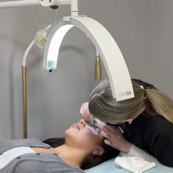 Angelic Beauty - Esthetician Sam doing my lashes