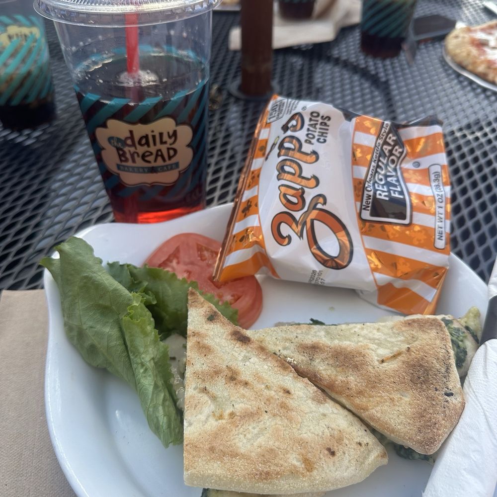The Daily Bread Bakery & Cafe - Turkey Spinach Artichoke Flatbread Sandwich - Bakeries Near Me - St. Louis, Missouri The Daily Bread Bakery & Cafe - Turkey Spinach Artichoke Flatbread Sandwich - Bakeries Near Me - St. Louis, Missouri