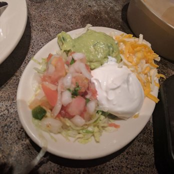 Uncle Julio's - Side plate of toppings. We both got one place each - Tex-Mex Near Me - Woodbridge, Virginia Uncle Julio's - Side plate of toppings. We both got one place each - Tex-Mex Near Me - Woodbridge, Virginia
