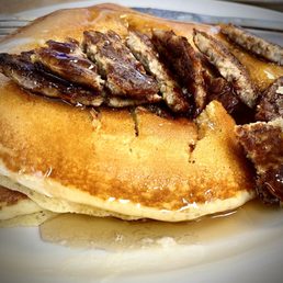 Short stack of pancakes with two sausage patties. That's my presentation not theirs. It looked yummier when it arrived!