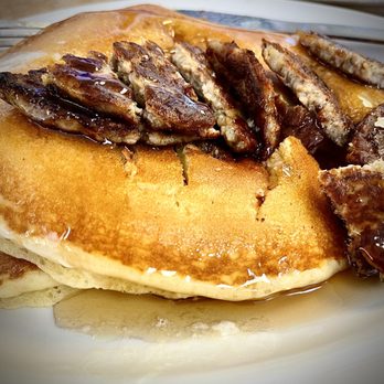 Doc's Diner - Short stack of pancakes with two sausage patties. That's my presentation not theirs. It looked yummier when it arrived! - Seafood Near Me - Key Largo, Florida