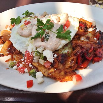 The Lowry - Chilaquiles with over easy fried egg - Bars Near Me - Minneapolis, Minnesota The Lowry - Chilaquiles with over easy fried egg - Bars Near Me - Minneapolis, Minnesota