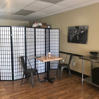The Coffee Bucket - a room with a table and chairs - Coffee & Tea Near Me - Waterford, Michigan The Coffee Bucket - a room with a table and chairs - Coffee & Tea Near Me - Waterford, Michigan