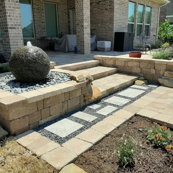 Lipani Designs - Raised paver patio with water feature and block wall. - Landscape Architects or Designers Near Me - Richmond, Texas Lipani Designs - Raised paver patio with water feature and block wall. - Landscape Architects or Designers Near Me - Richmond, Texas